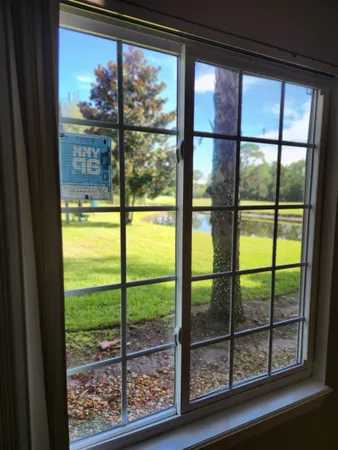 a view of a room and window