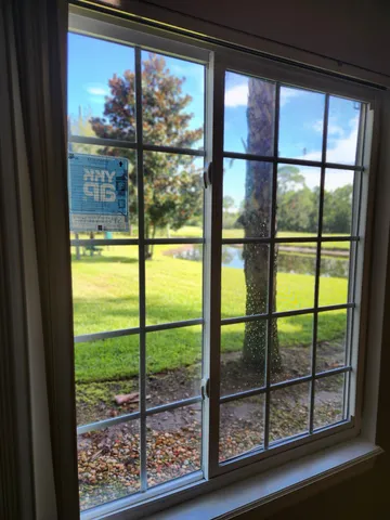 a view of a room and window