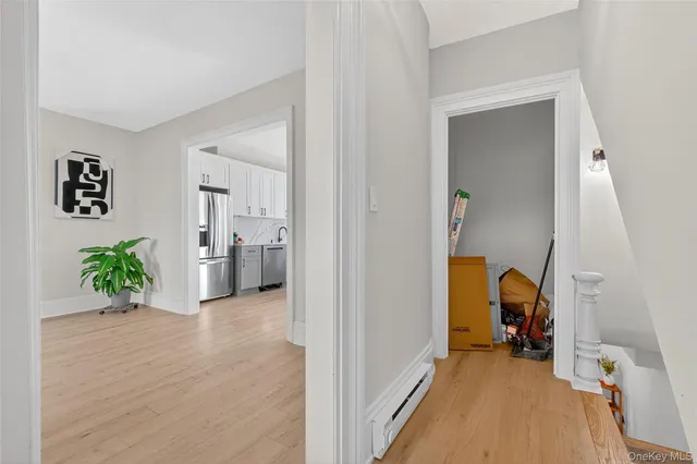 a view of a living room and bathroom