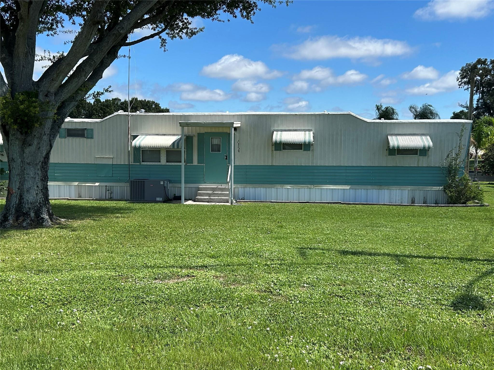 1379 Chobee Street Okeechobee, FL 34974 - Photo 13 of 13 a view of house with backyard