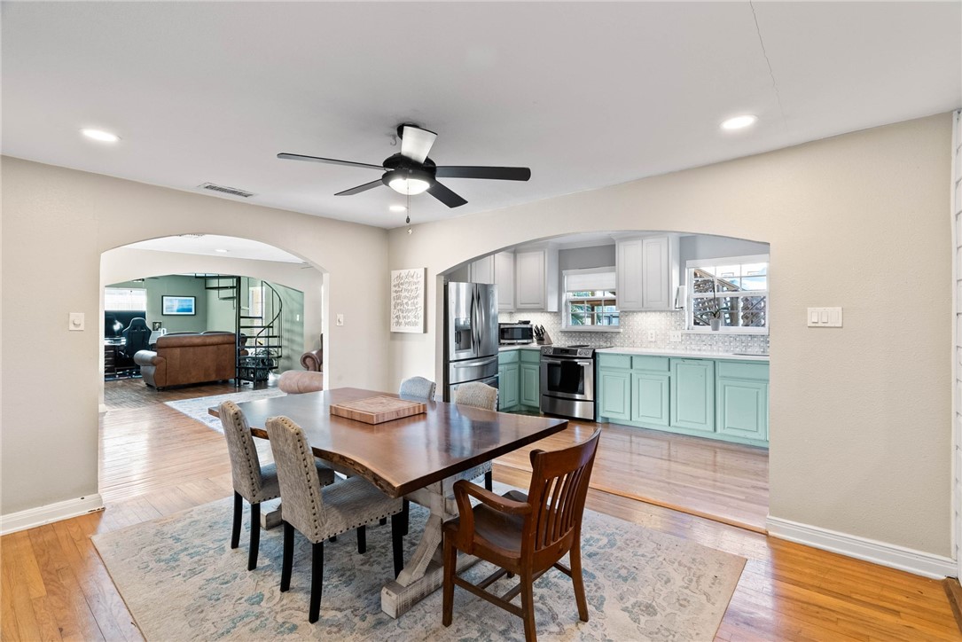 302 Cole Street Corpus Christi, TX 78404 - Photo 11 of 40 a view of a dining room with furniture and wooden floor