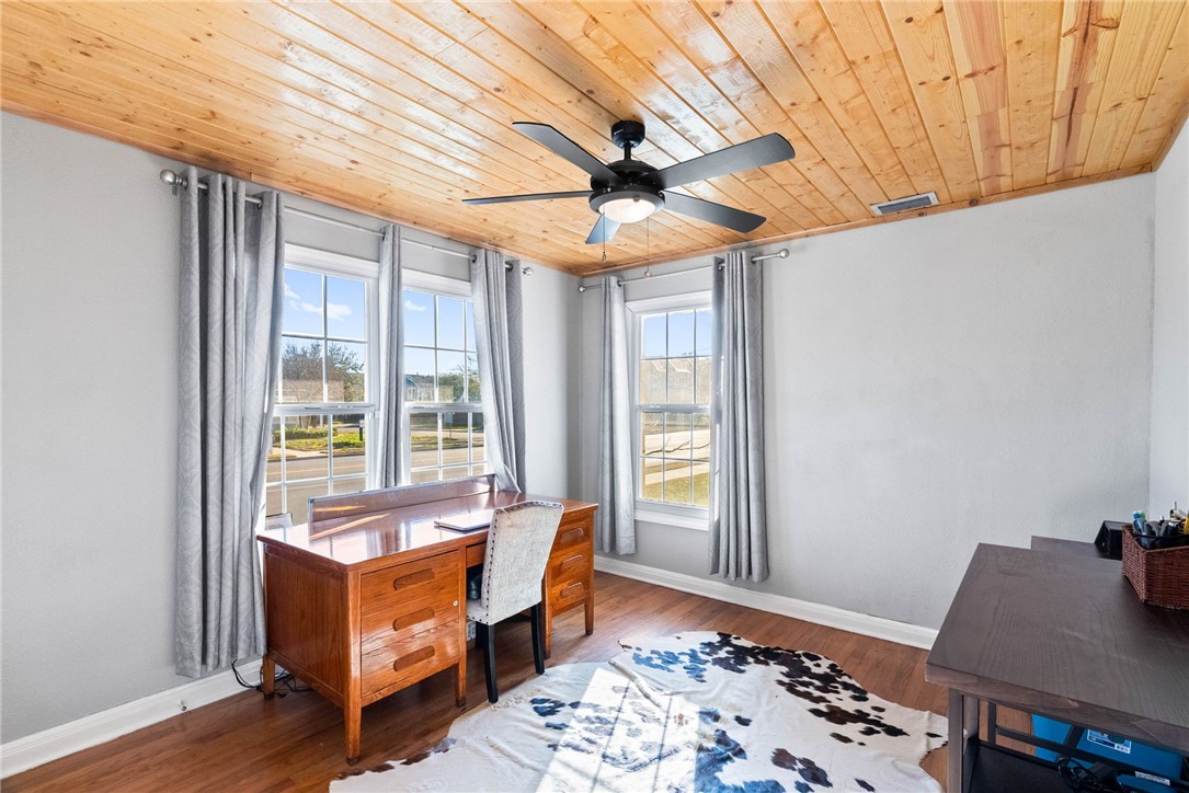 302 Cole Street Corpus Christi, TX 78404 - Photo 14 of 40 a bedroom with furniture and a window