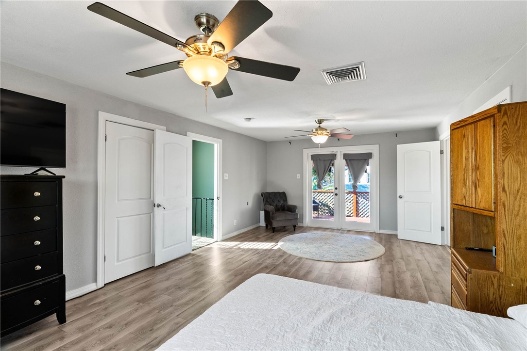 302 Cole Street Corpus Christi, TX 78404 - Photo 25 of 40 a living room with furniture and a flat screen tv