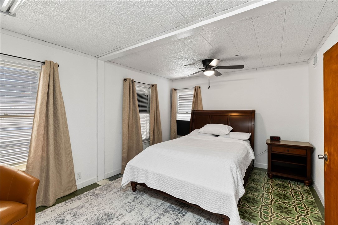 302 Cole Street Corpus Christi, TX 78404 - Photo 30 of 40 a bedroom with a bed and a window