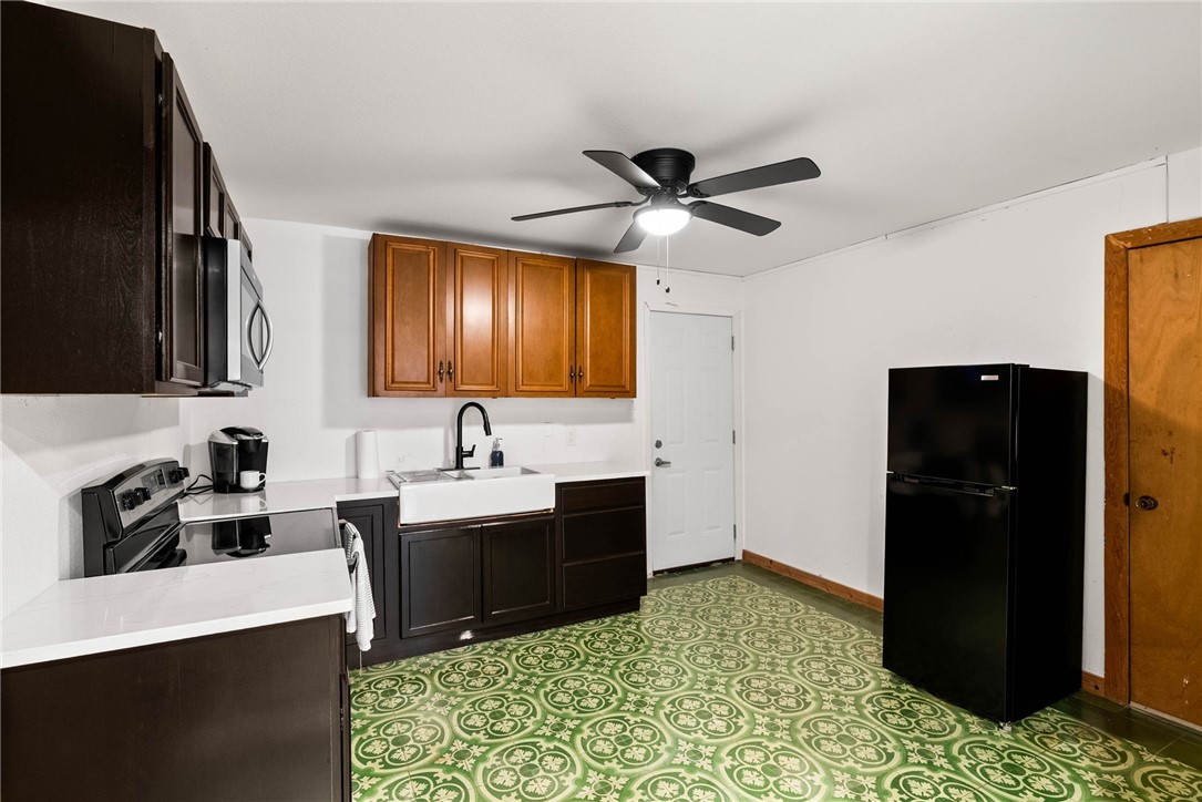 302 Cole Street Corpus Christi, TX 78404 - Photo 31 of 40 a view of a kitchen with a sink and cabinets