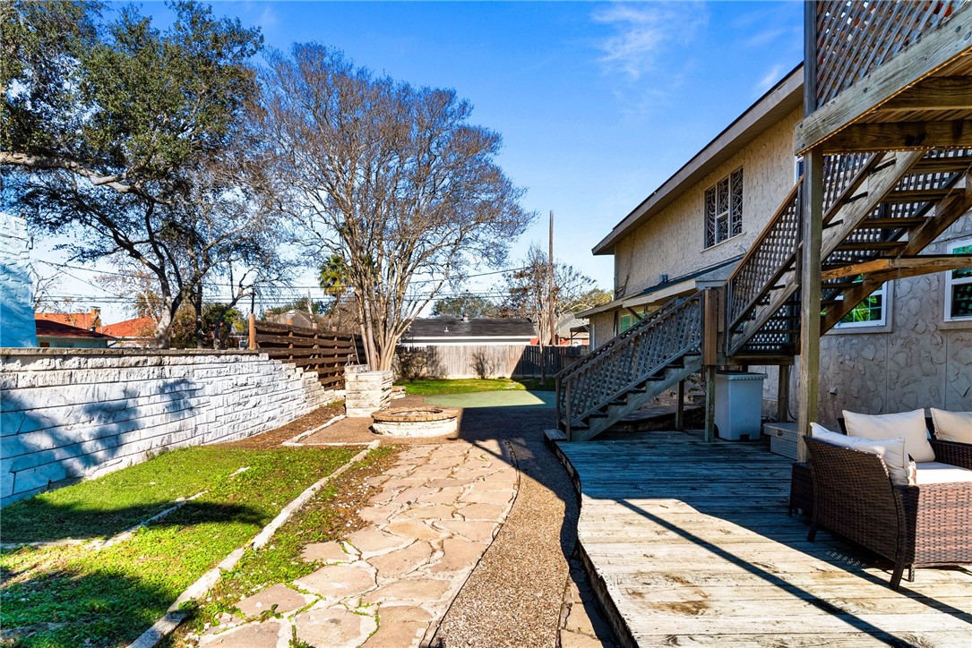 302 Cole Street Corpus Christi, TX 78404 - Photo 36 of 40 a view of a house with backyard and sitting area