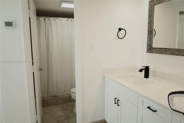 a view of a workspace with furniture