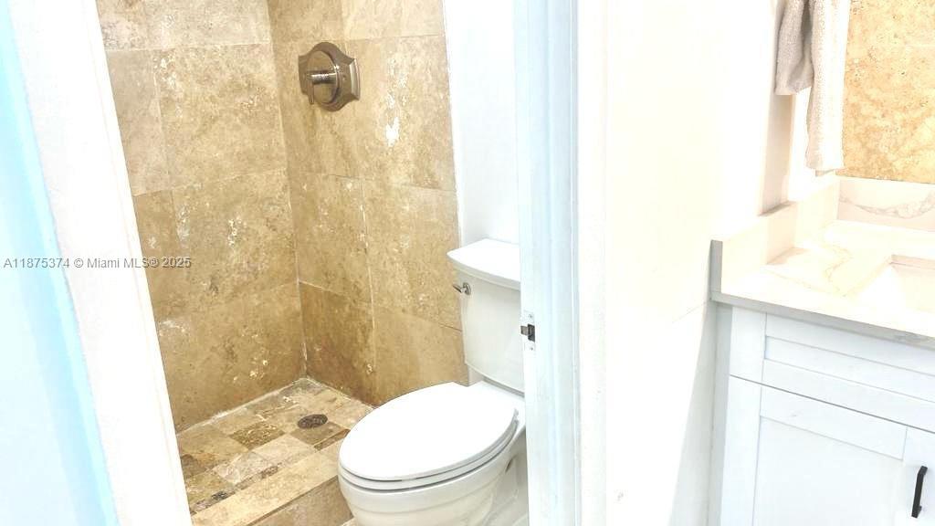 500 Bayview Drive, Unit 230 Sunny Isles Beach, FL 33160 - Photo 25 of 48 a bathroom with a toilet and a shower