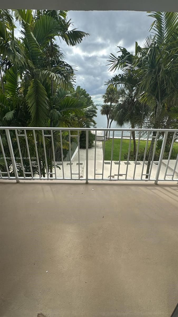 500 Bayview Drive, Unit 230 Sunny Isles Beach, FL 33160 - Photo 3 of 48 a view of balcony with floor to ceiling window and tree