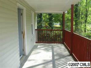 605 Morningside Road Charlotte, NC 28214 - Photo 4 of 8 a balcony with wooden floor