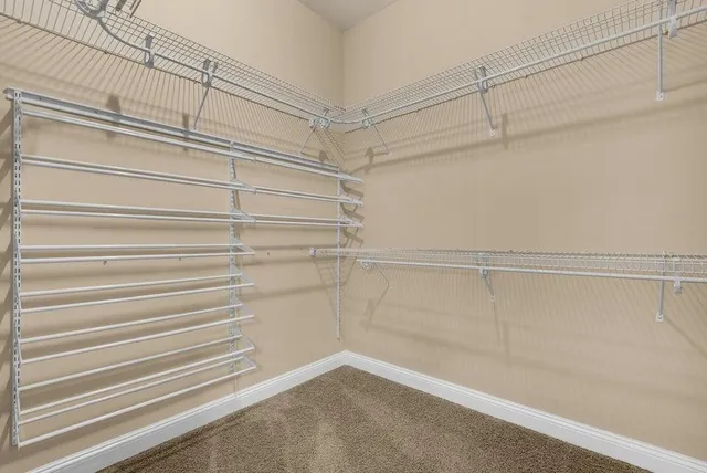 a view of a room with racks on the wall