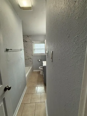 a bathroom with a sink and a shower