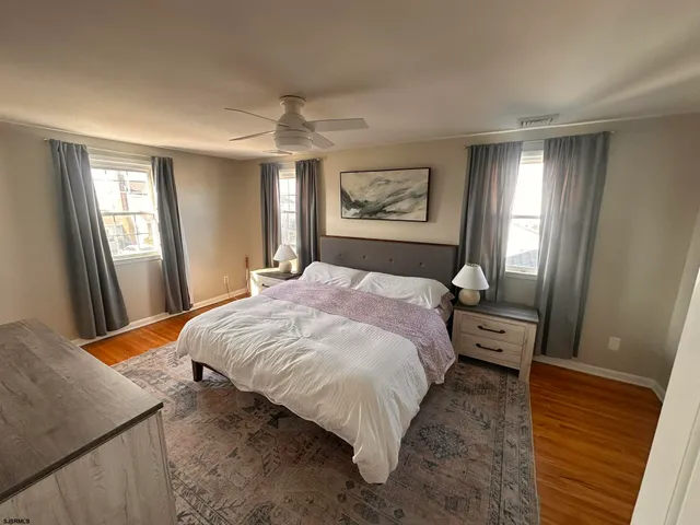 a bedroom with a bed and a view of bathroom