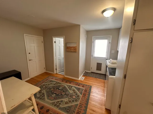 a view of a backyard with sitting area