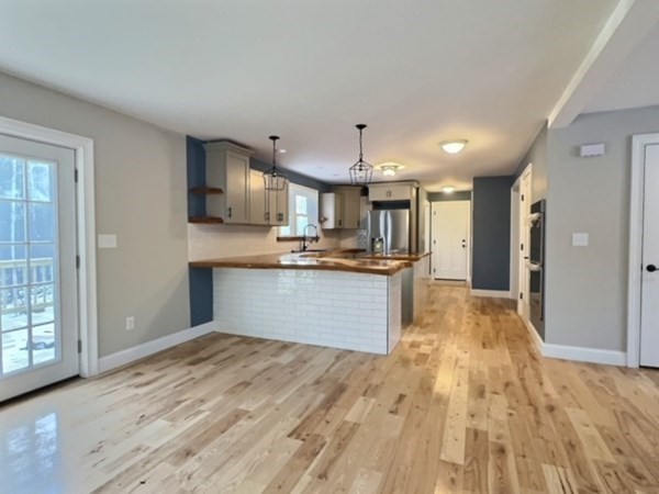 108 Holt Road Ashburnham, MA 01430 - Photo 3 of 17 a view of kitchen with wooden floor