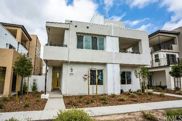 a front view of a house with garage