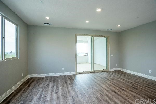 146 Spectacle Irvine, CA 92618 - Photo 12 of 57 wooden floor in an empty room with a window