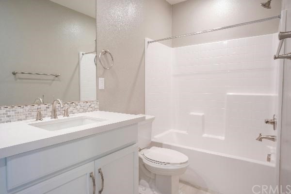 146 Spectacle Irvine, CA 92618 - Photo 28 of 57 a bathroom with a sink a toilet and shower