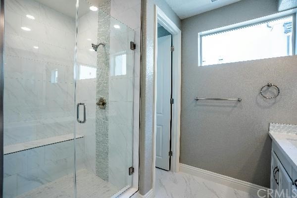 146 Spectacle Irvine, CA 92618 - Photo 44 of 57 a bathroom with a shower