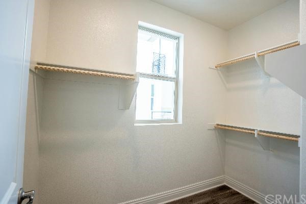 146 Spectacle Irvine, CA 92618 - Photo 47 of 57 a view of a room with rack on the wall and a window