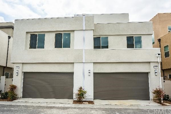 146 Spectacle Irvine, CA 92618 - Photo 6 of 57 a front view of a house