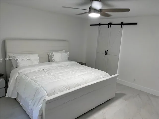 a bathroom with a double vanity sink and mirror