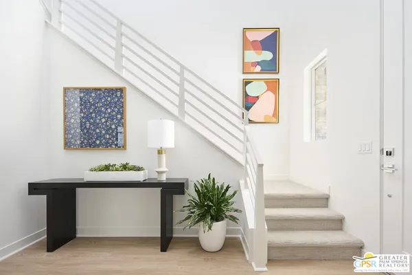 a view of entryway with a front door