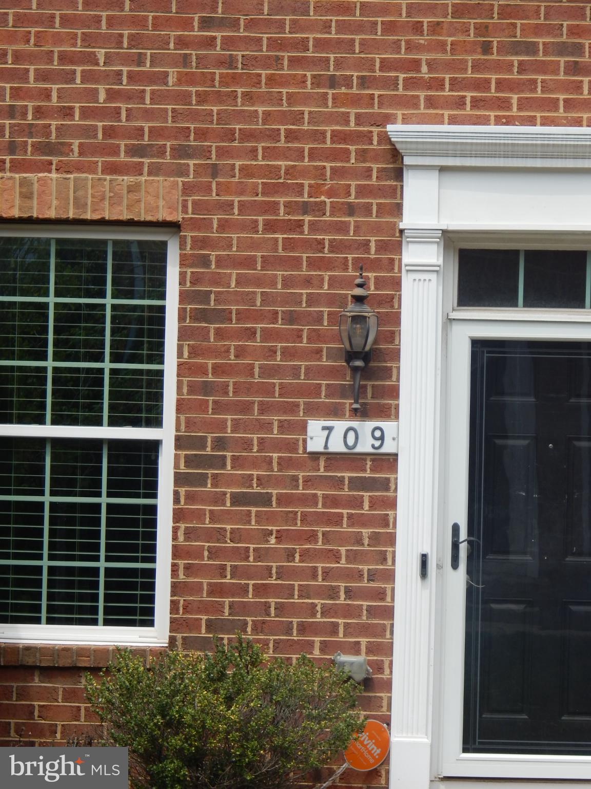 709 South Macon Street Baltimore, MD 21224 - Photo 2 of 8 a brick building with a window