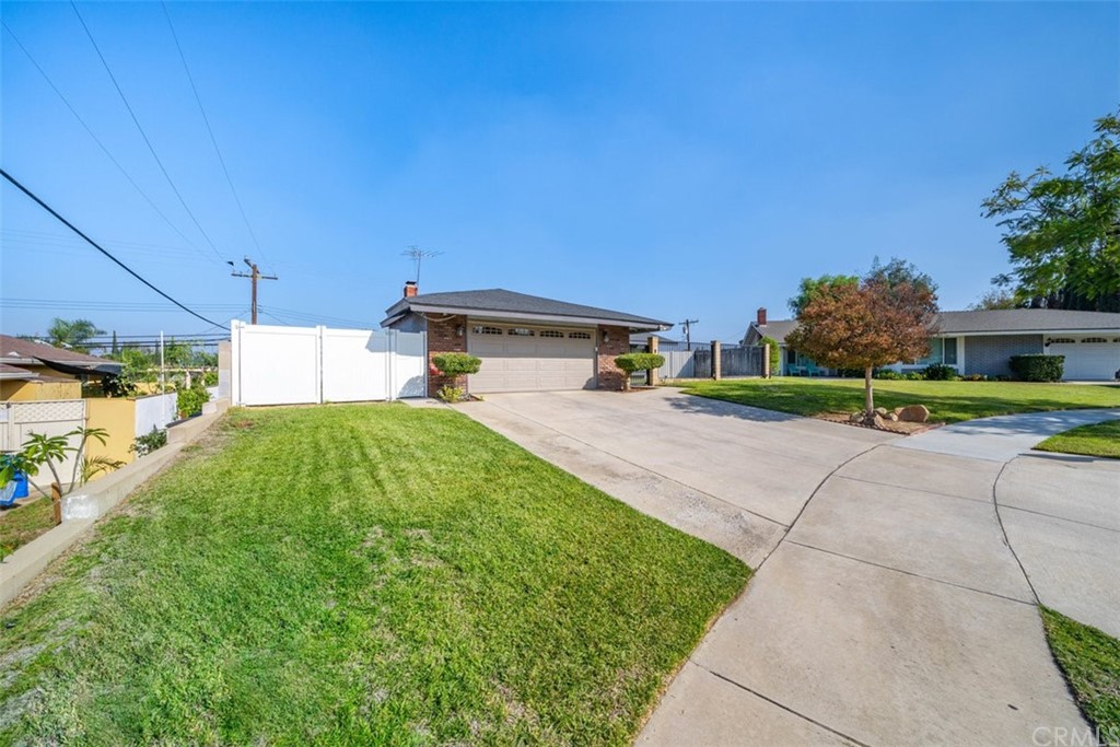 4906 Redrock Avenue Riverside, CA 92503 - Photo 1 of 1 a view of a house with a yard