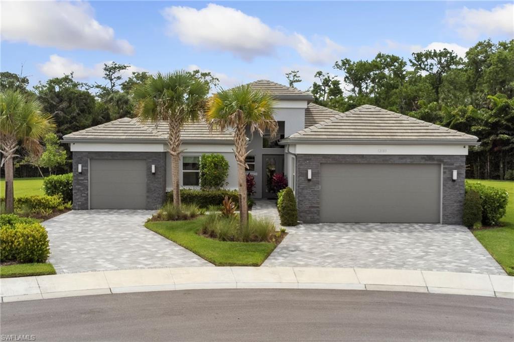 12083 Azalea Way Naples, FL 34120 - Photo 2 of 48 Beautiful curb appeal, with dual driveways.