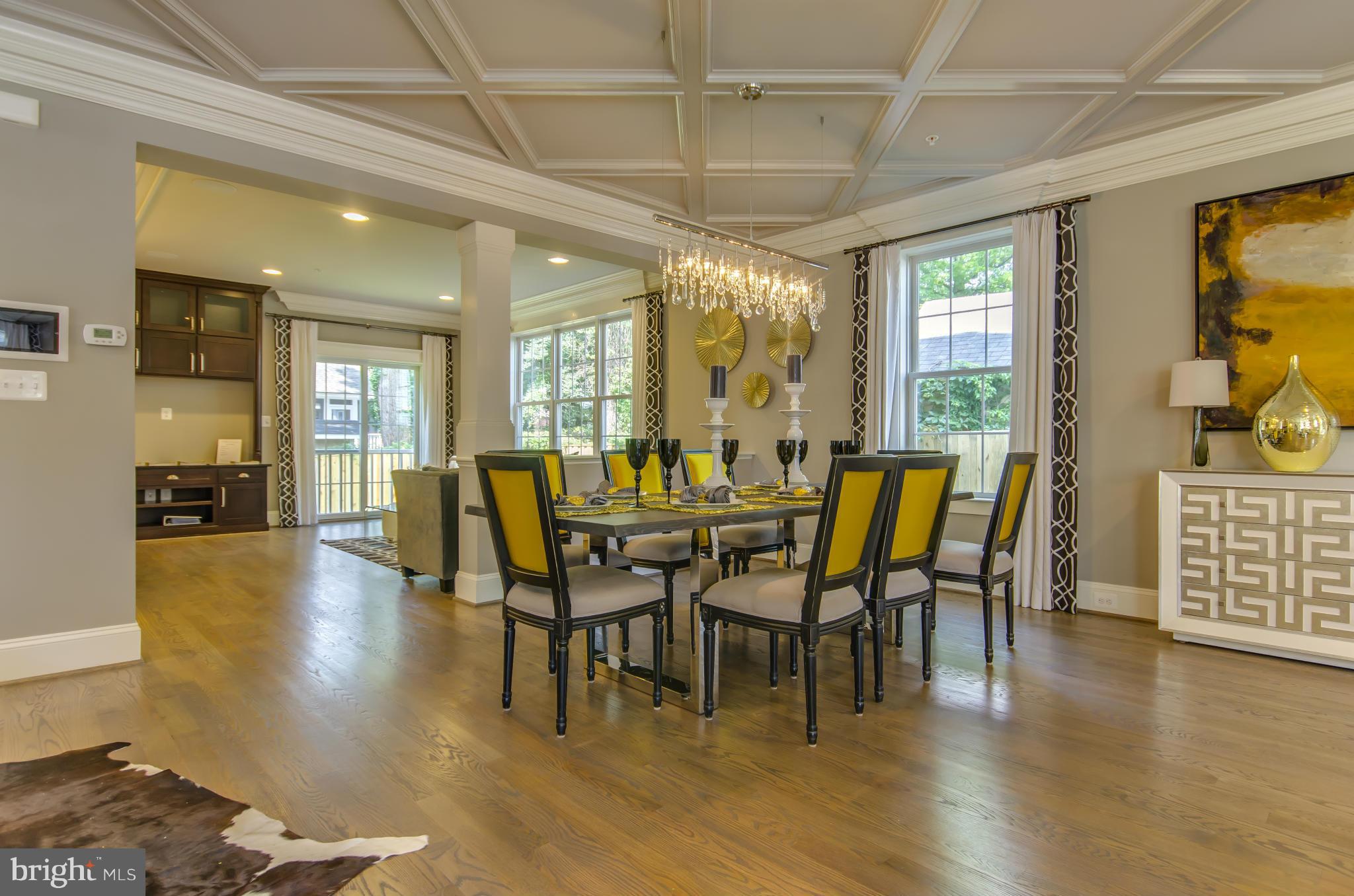 8106 Old Georgetown Road Bethesda, MD 20814 - Photo 8 of 30 a view of a dining room with furniture window and wooden floor