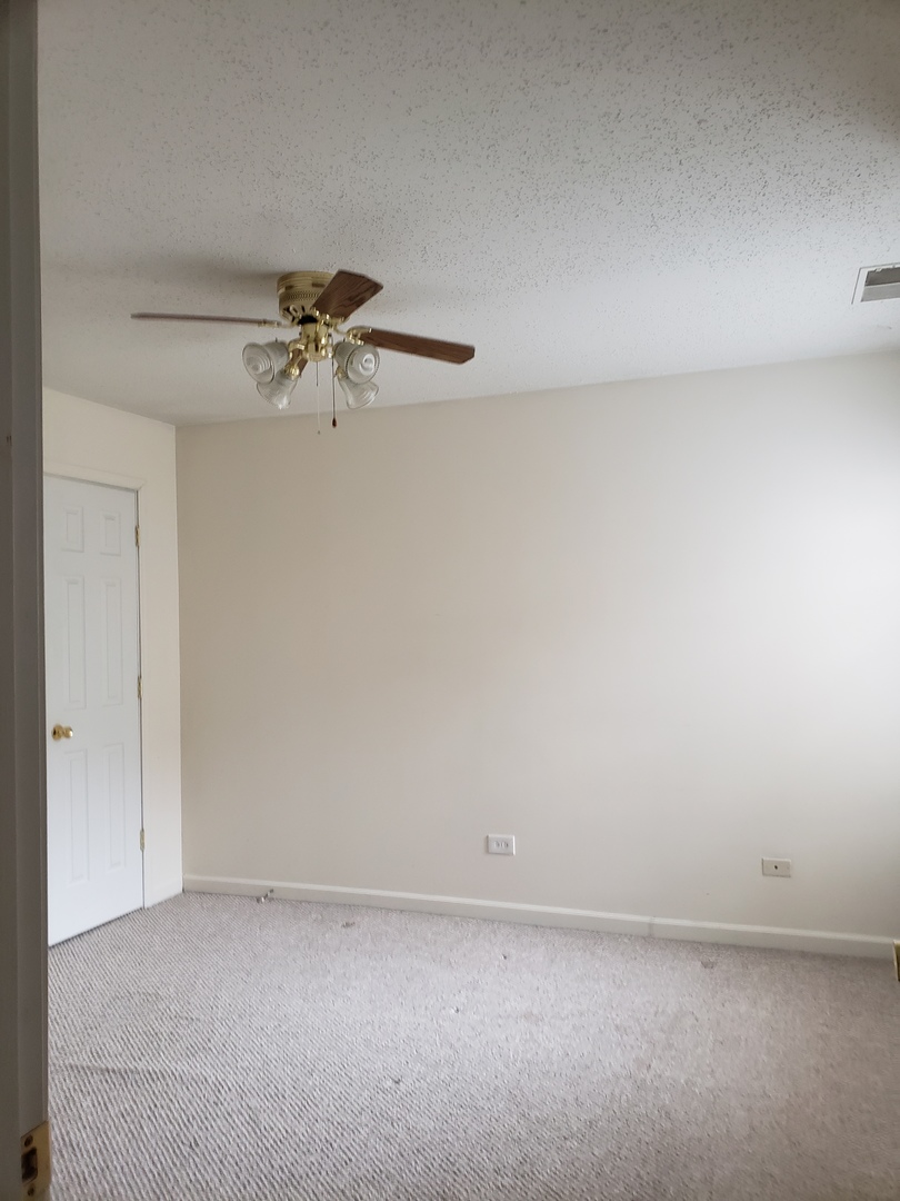 1969 North Hicks Road, Unit 102 Palatine, IL 60074 - Photo 11 of 17 a view of an empty room