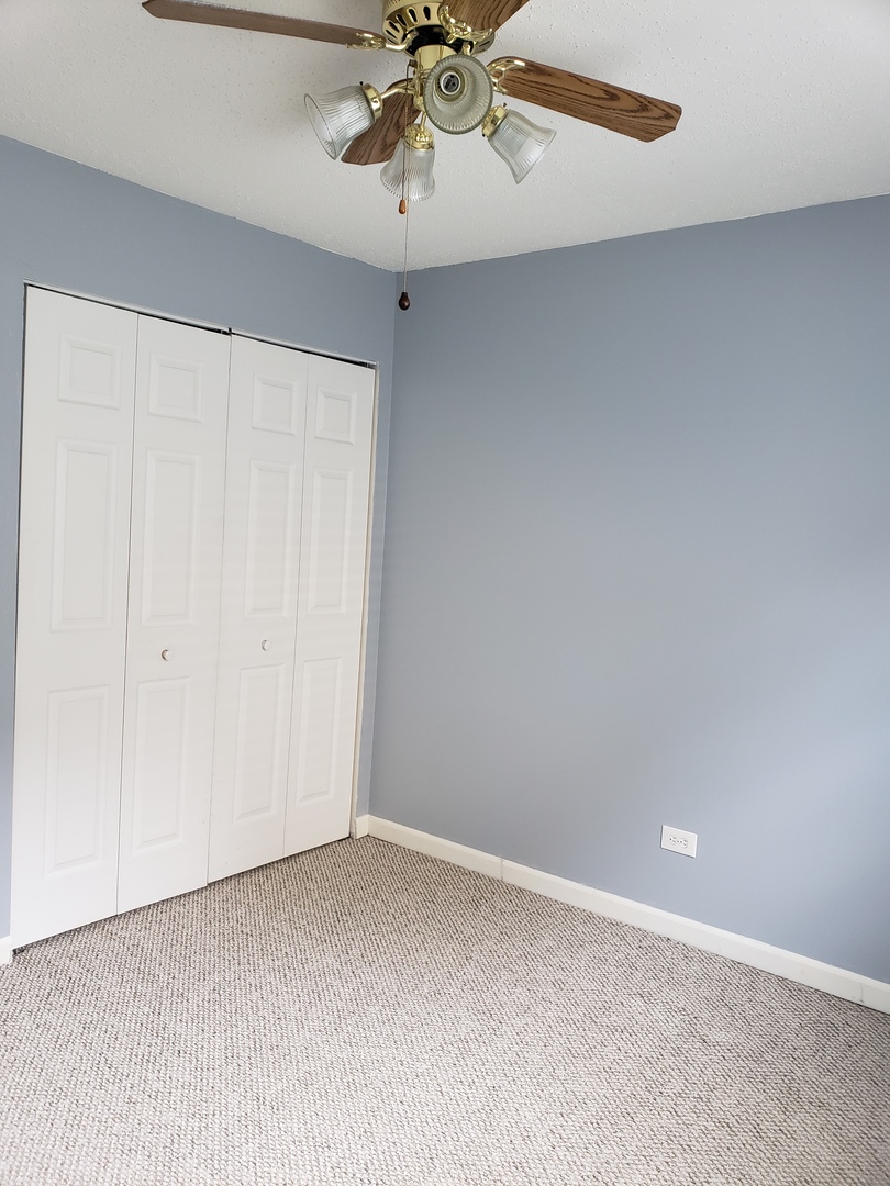 1969 North Hicks Road, Unit 102 Palatine, IL 60074 - Photo 13 of 17 a view of an empty room