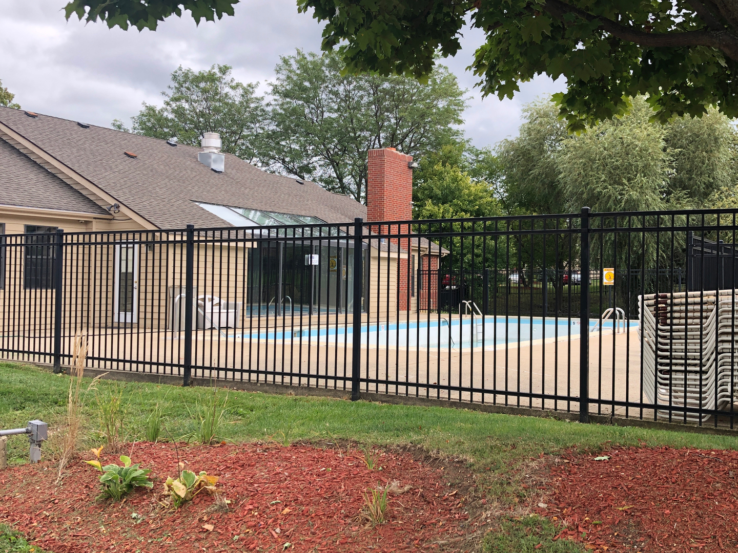1969 North Hicks Road, Unit 102 Palatine, IL 60074 - Photo 14 of 17 a view of a wrought iron fences in front of the house