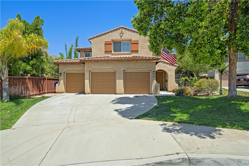 1010 Greenway Road Oceanside, CA 92057 - Photo 1 of 1 The front of the home is beautifully landscaped with a three car garage plus 3 more cars can fit in the driveway.