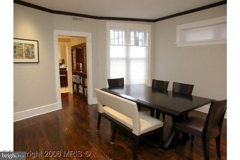 a view of a workspace with furniture