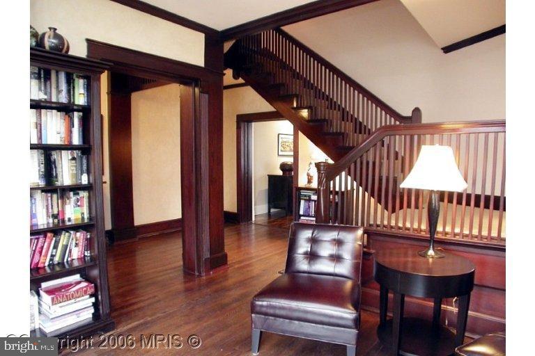 1905 16th Street Northwest Washington, DC 20009 - Photo 6 of 9 a view of front door with entryway and wooden floor