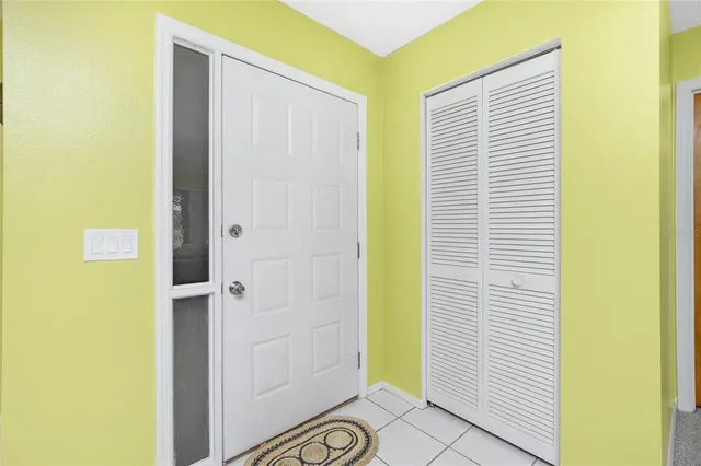 a view of a bathroom with a shower and a sink