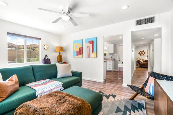 a living room with furniture and a window
