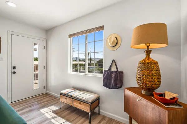 a living room with furniture and a window