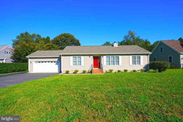 front view of a house with a big yard