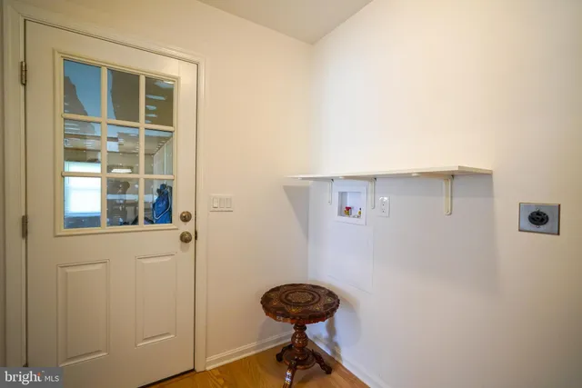 a view of a livingroom with furniture and windows