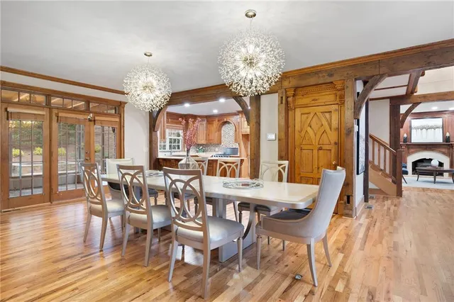 a view of an entryway with wooden floor and stairs