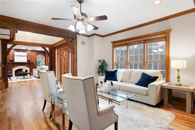 a room with a wooden floor and cabinets
