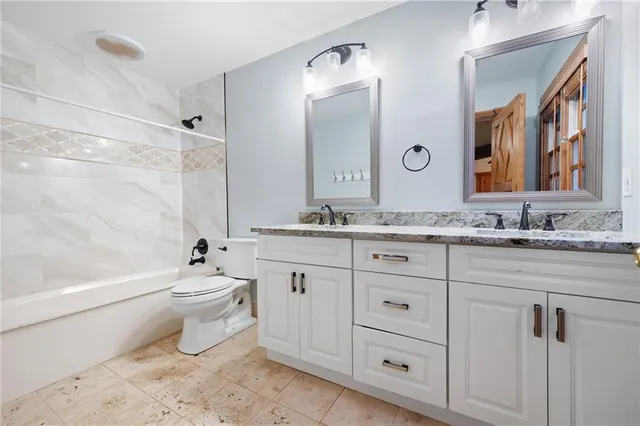 a view of a swimming pool with a lounge chairs
