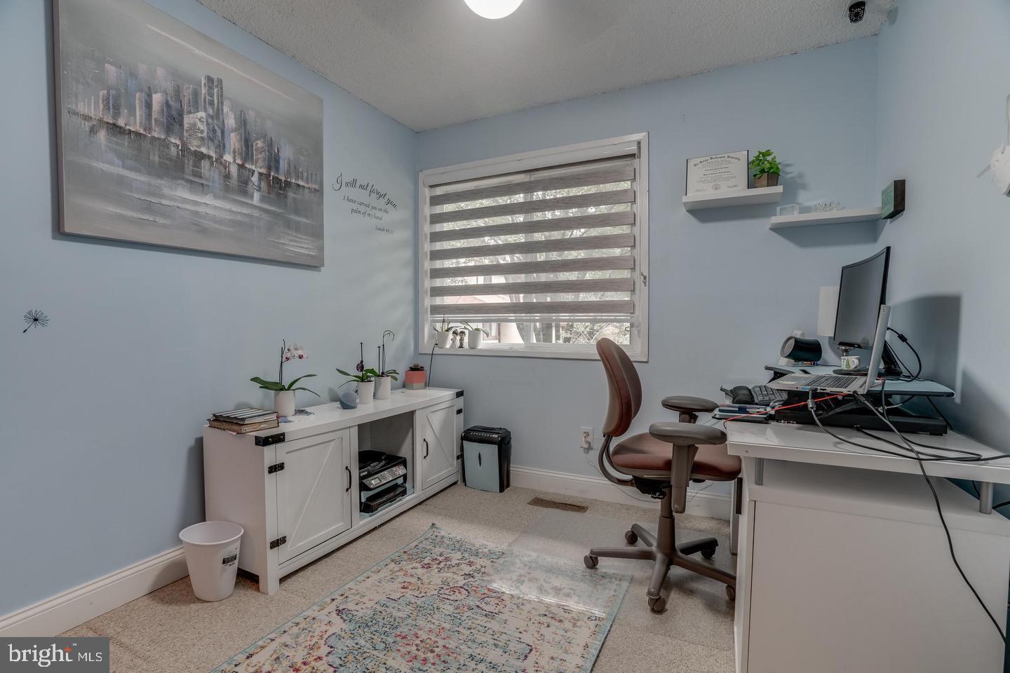 2132 Cartwright Place Reston, VA 20191 - Photo 20 of 21 a view of a workspace with furniture and a window