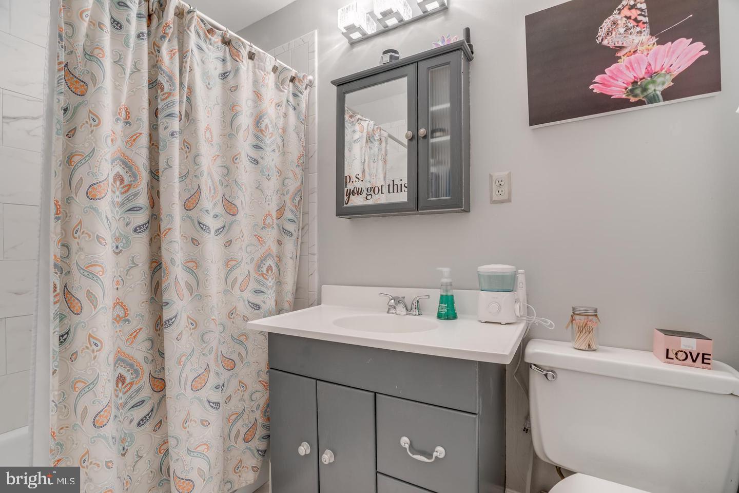 2132 Cartwright Place Reston, VA 20191 - Photo 21 of 21 a bathroom with a sink vanity and a mirror