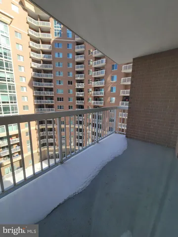 a view of kitchen with cabinets and wooden floor