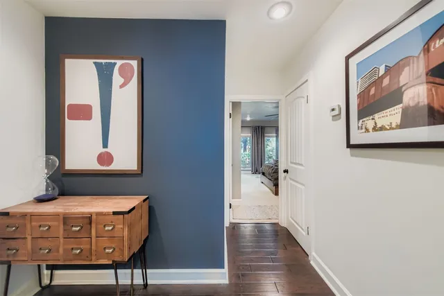 a view of an entryway with wooden floor
