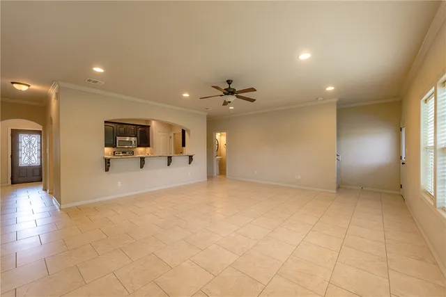 a view of a livingroom with furniture and a flat screen tv